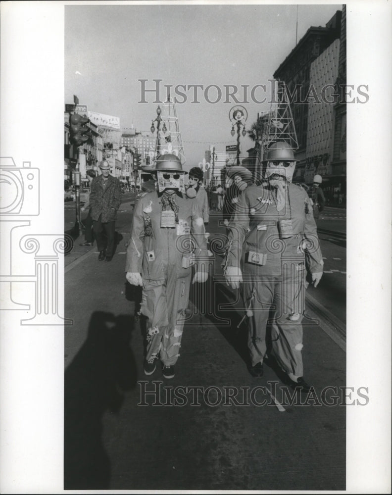 1971 Carnival maskers with Odd Couple  - Historic Images