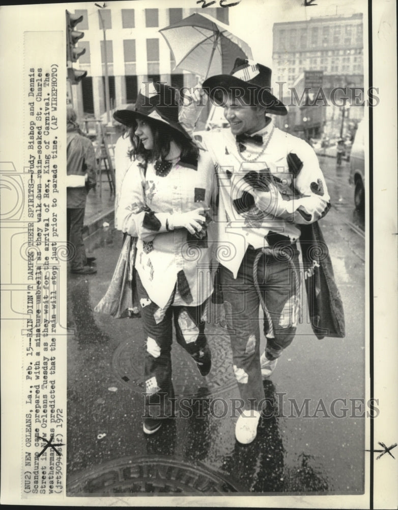 1972 Judy Bishop and Dennis Scandurno prepared with mini umbrella - Historic Images