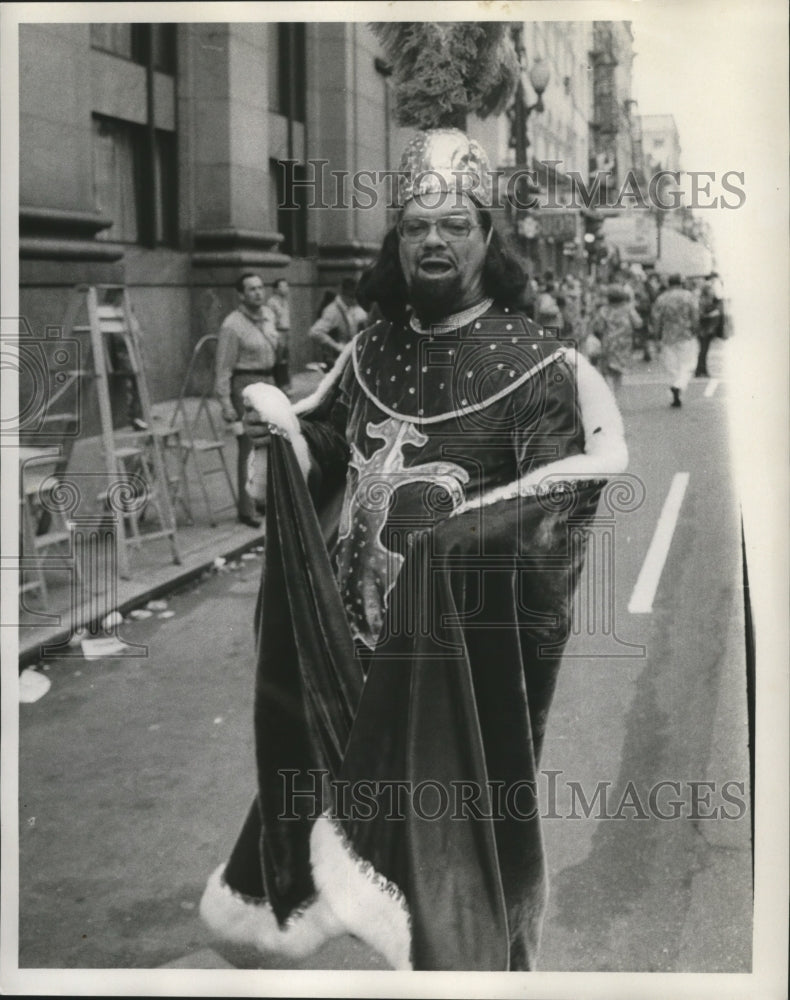 1973 Carnival masker in royal robes.  - Historic Images