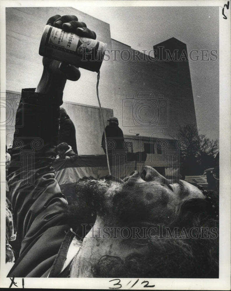 1978 Maskers Takes a Drink at Mardi Gras, New Orleans  - Historic Images