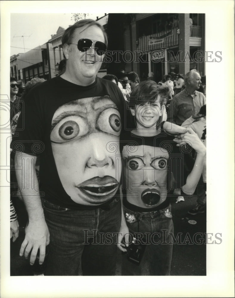 1990 Jerry Roberson and his son Case show off Costume at Mardi Gras - Historic Images