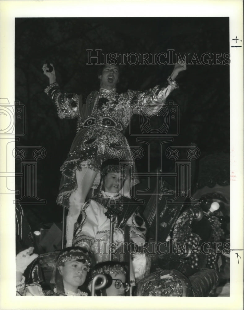 1990 Maskers Cheering While at Mardi Gras, New Orleans  - Historic Images