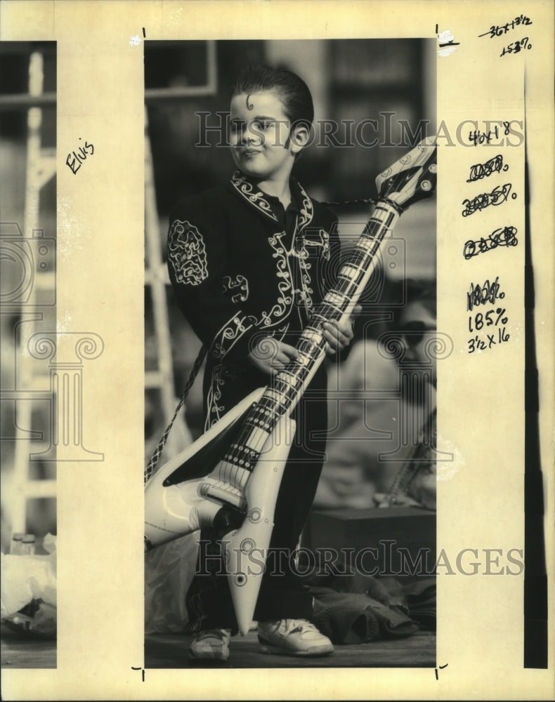 1992 Five year old Derek Lawson has the Elvis look in Rex Parade. - Historic Images