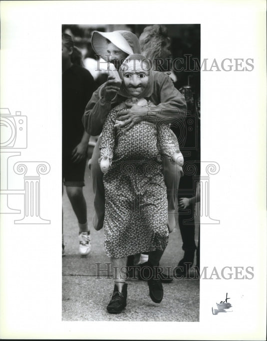 1992 "Baby" David Lecompte brought along his own bottle and "Mom" - Historic Images