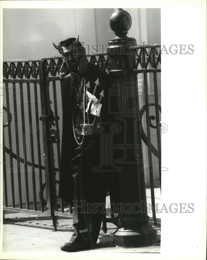 1993 James Polander dressed as Lucifer, front of St. Louis Cathedral - Historic Images