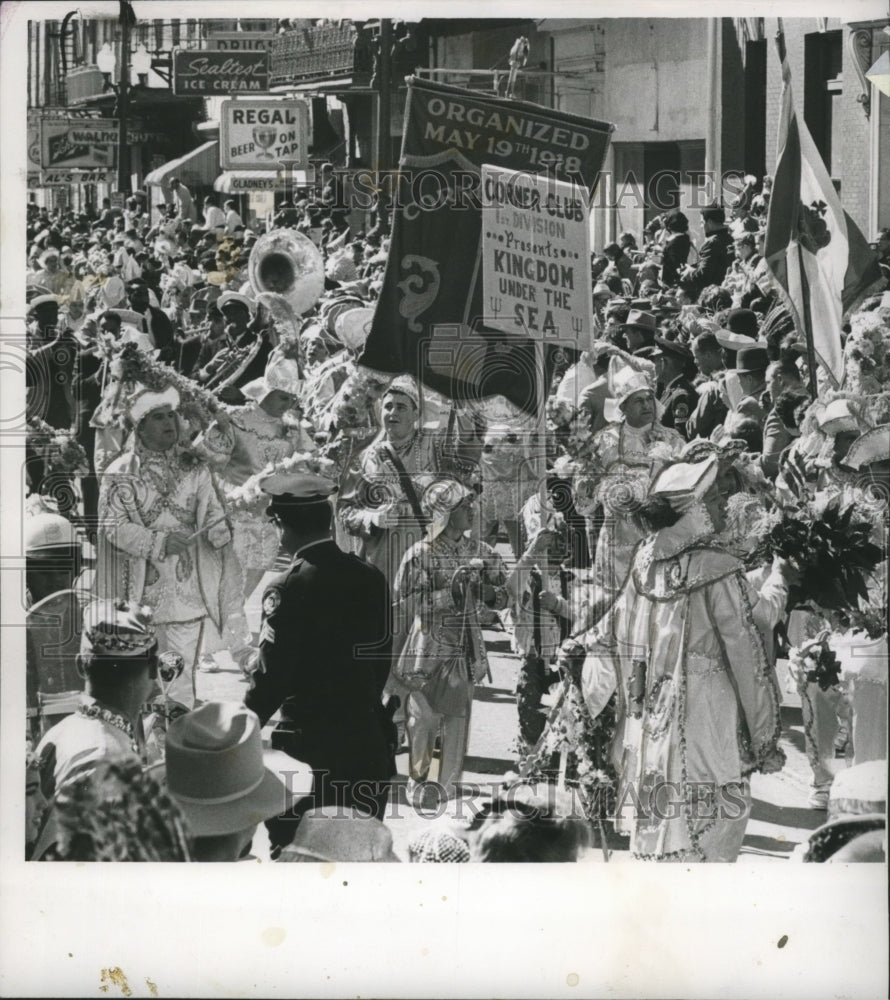 1964 The Carnival Marching Club Corner Club marches in a parade - Historic Images