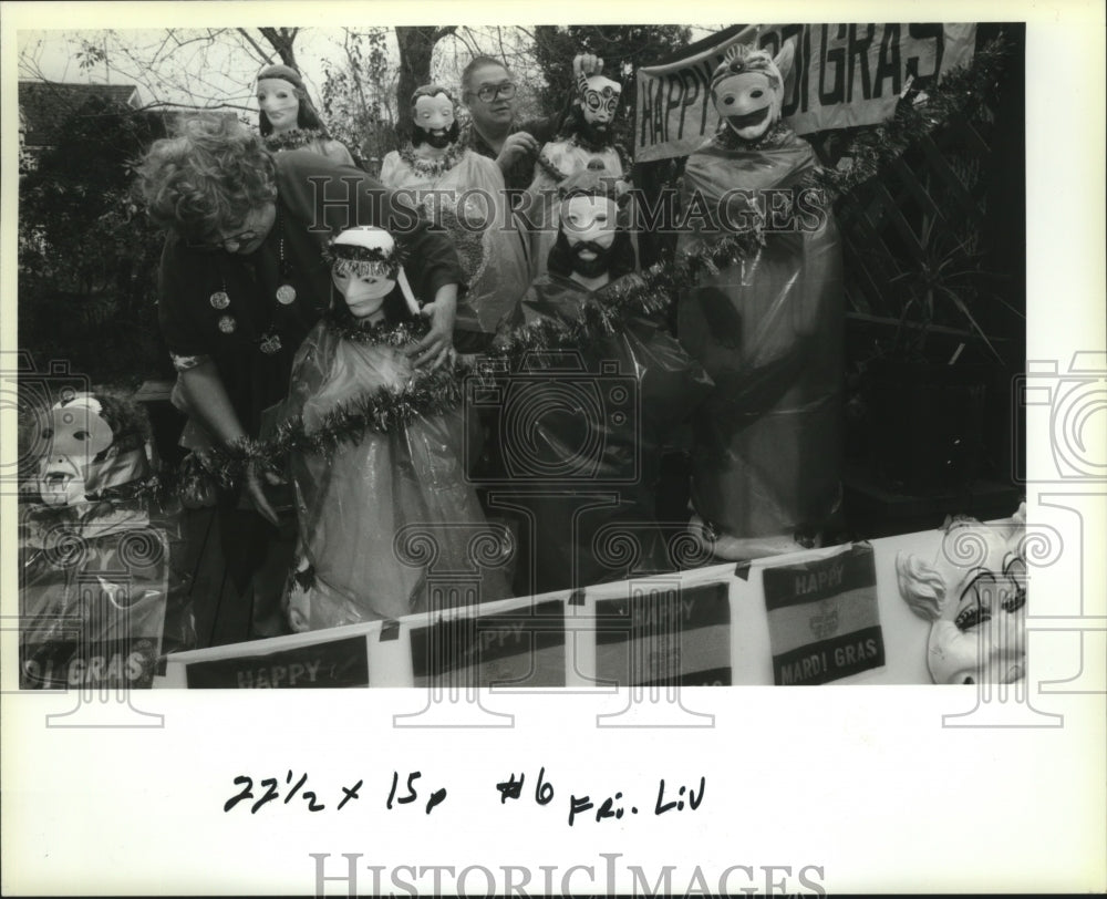 1993 Verna &amp; Sidney Arroyos Adjust Float for New Orleans Mardi Gras - Historic Images