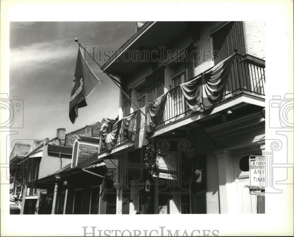 1994 Banners Displayed at Balcony 717 Peters St. in New Orleans - Historic Images