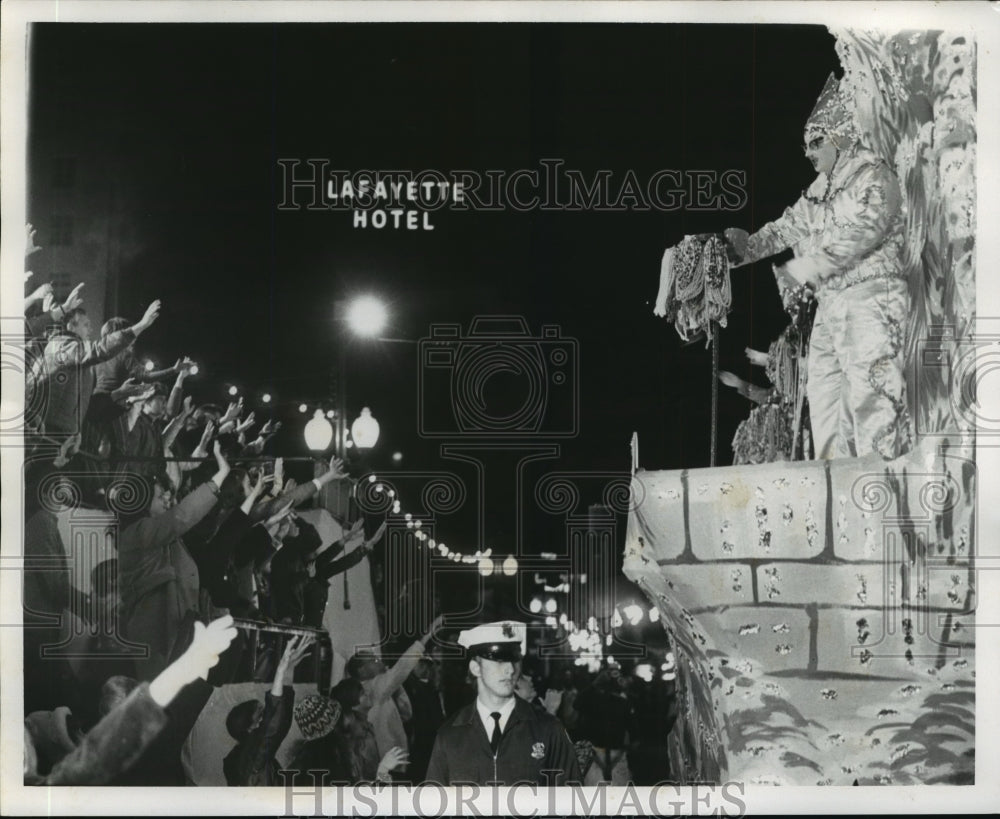 1972 Knights of Babylon Parade Float Riders Offer Beads at Carnival - Historic Images