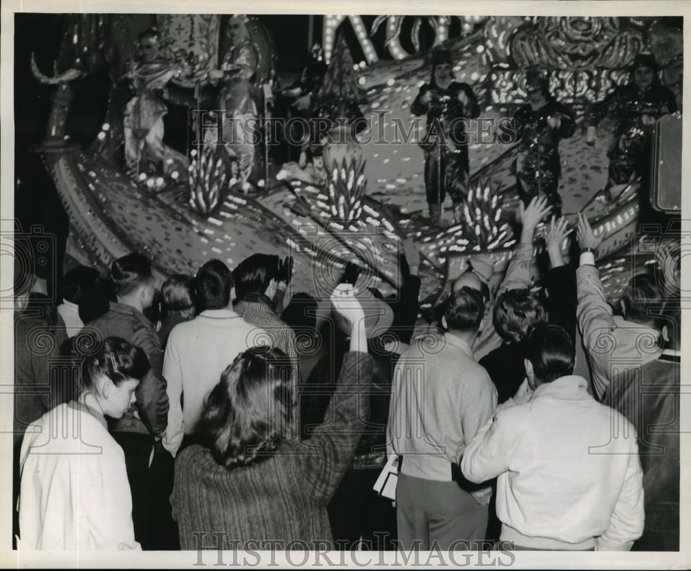 1961 Crowd Watches Knights of Babylon Floats on Parade at Carnival - Historic Images