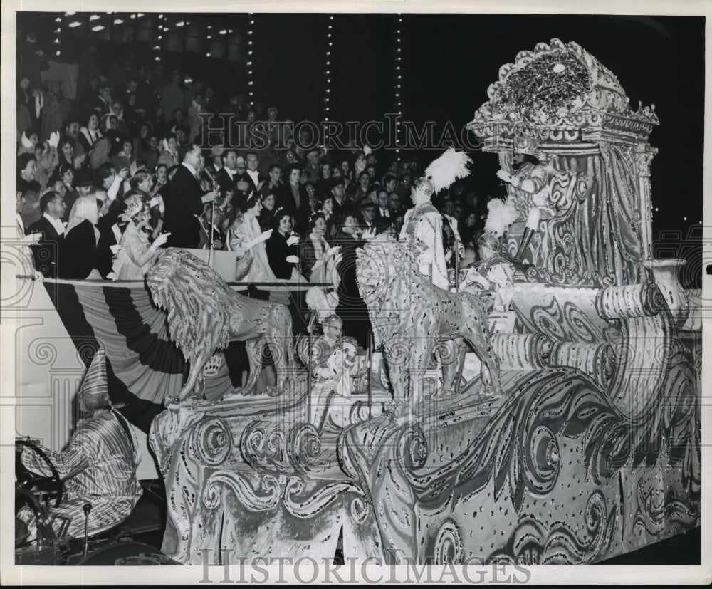 1961 King Waves to Crowd at Knights of Babylon Parade at Carnival. - Historic Images