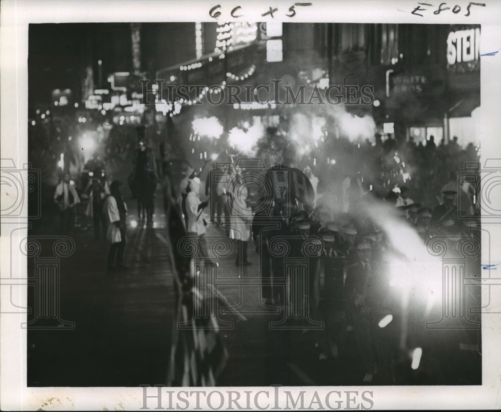 1965 Smoke From Torches Transform Mardi Gras Parade as Ghostly - Historic Images