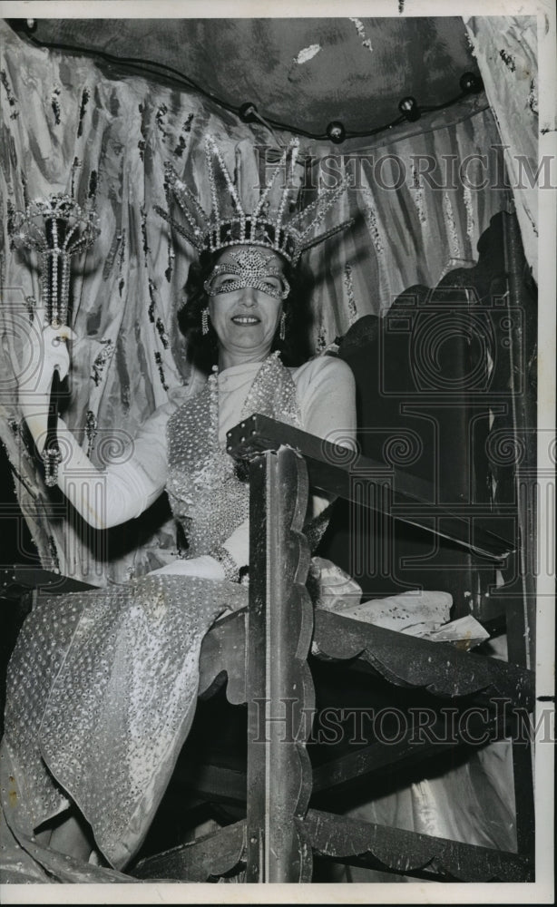 1961 Queen of the Adonis Mardi Gras Parade sits on her throne float - Historic Images