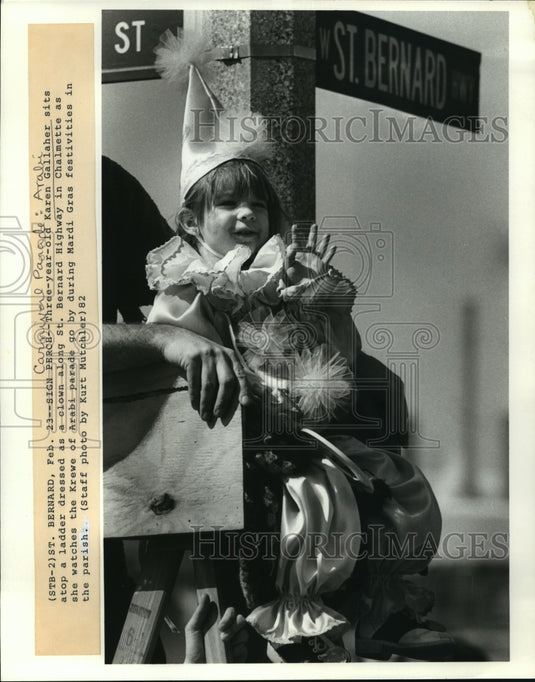 1987 Karen Gallaher Sits Atop a Ladder as Clown During Arabi Parade - Historic Images