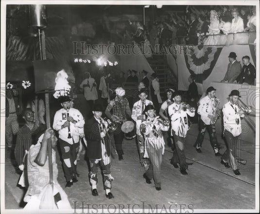 1964 Marching Band Walking in Carnival Parade at Mardi Gras - Historic Images