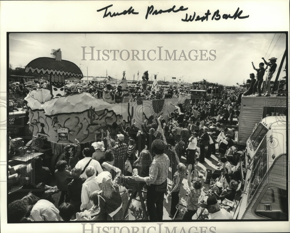 1980 Large Crowd Watches Truck Parade at West Bank at Mardi Gras - Historic Images