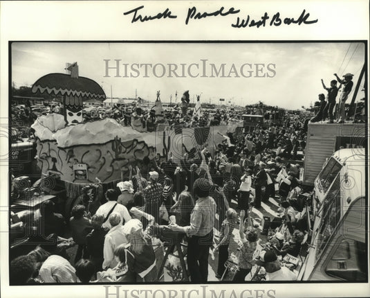 1980 Large Crowd Watches Truck Parade at West Bank at Mardi Gras - Historic Images