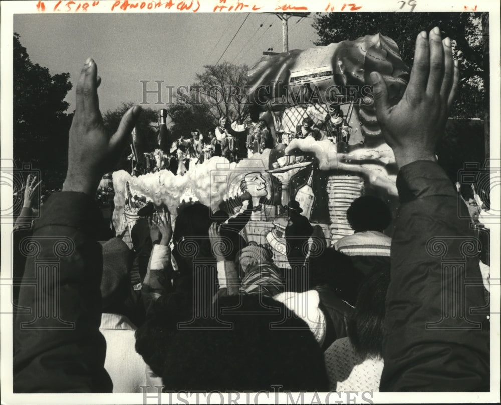 1982 Crowds Reach for Beads from Krewe of Pandora Float, Mardi Gras - Historic Images