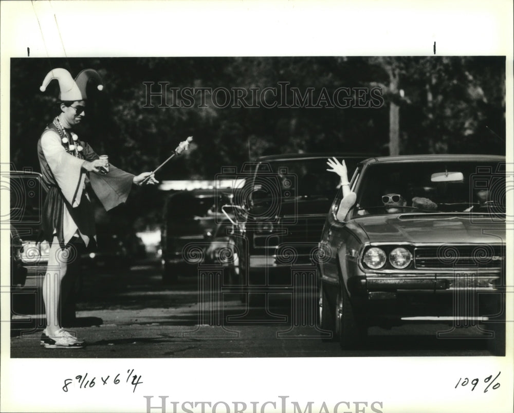 1991 Jester Chuck Kaloczi Waves Traffic Away From Mid City Parade - Historic Images