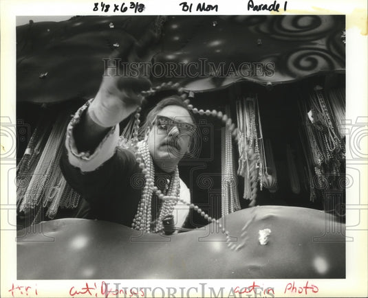 1993 Carnival Krewe of Dionysus Member Throwing Beads  - Historic Images