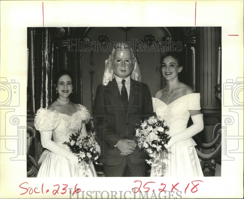 Carnival Ball Masker and two Maids at Olympians Carnival Ball. - Historic Images