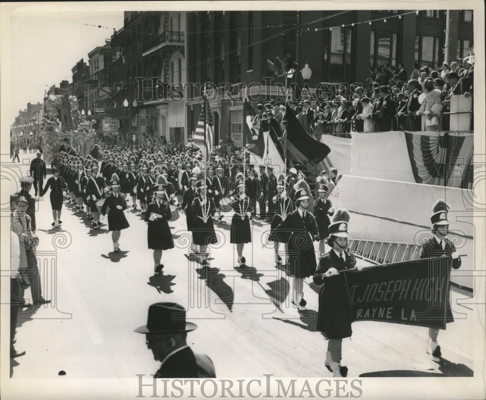 1963 Saint Joseph High Marching Band in Venus Carnival Parade - Historic Images