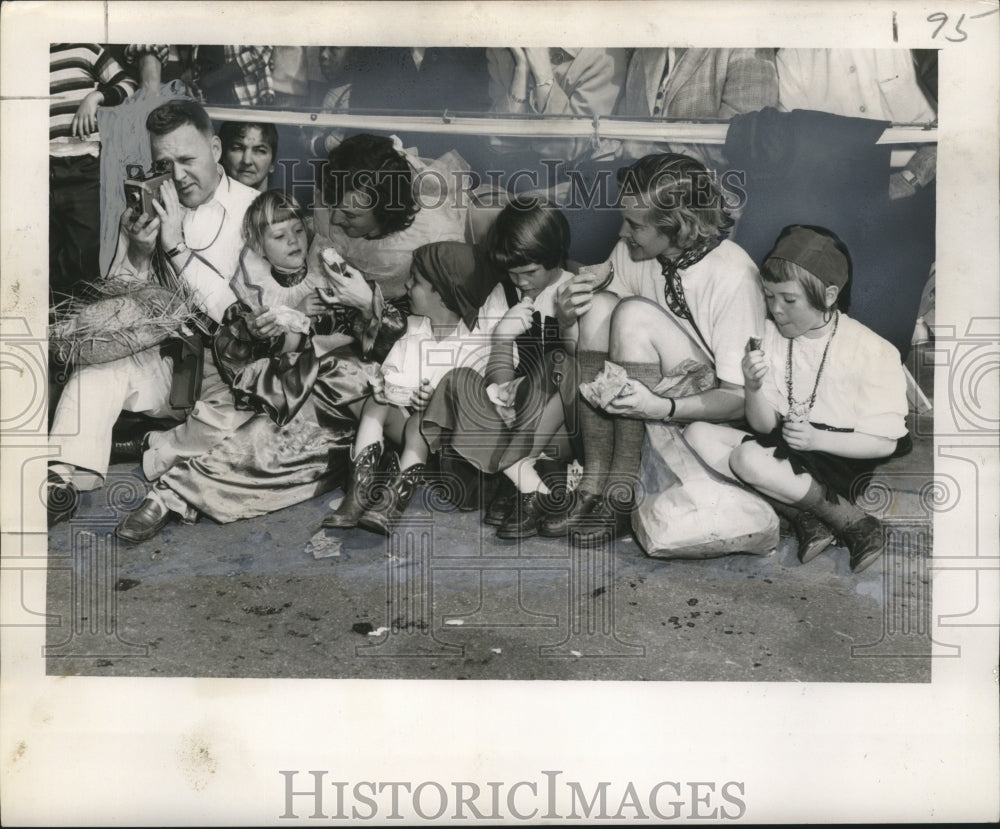 1956 Group with Children with Adults Enjoy Lunch During Carnival - Historic Images