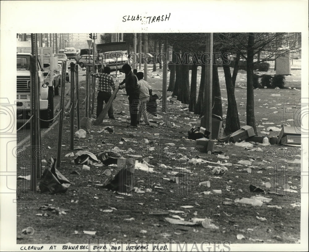 1985 Workers Picking up Tons of Debris after Mardi Gras  - Historic Images