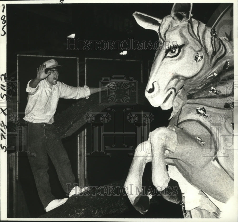 1981 Carnival Parade Parade goer Bill Berrault seems in trouble. - Historic Images