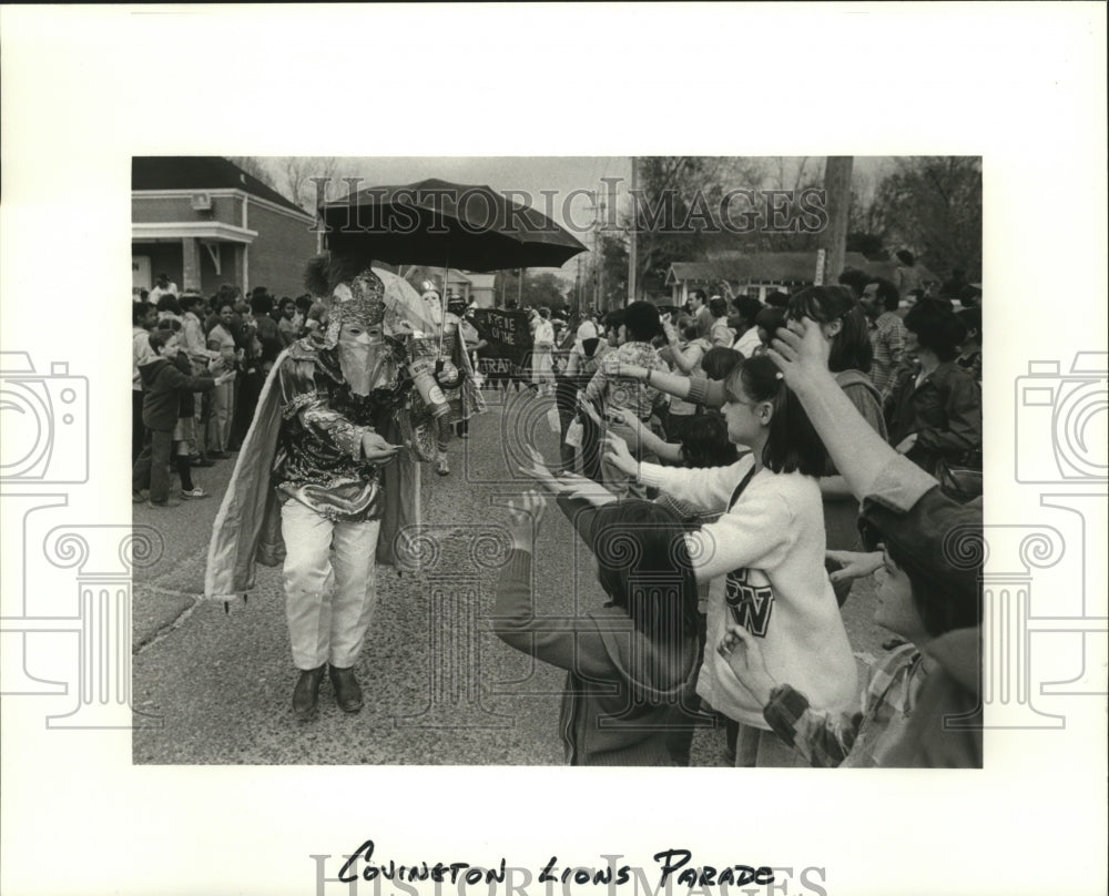 1980 Covington Lions Maskers Walk in Parade at Mardi Gras - Historic Images