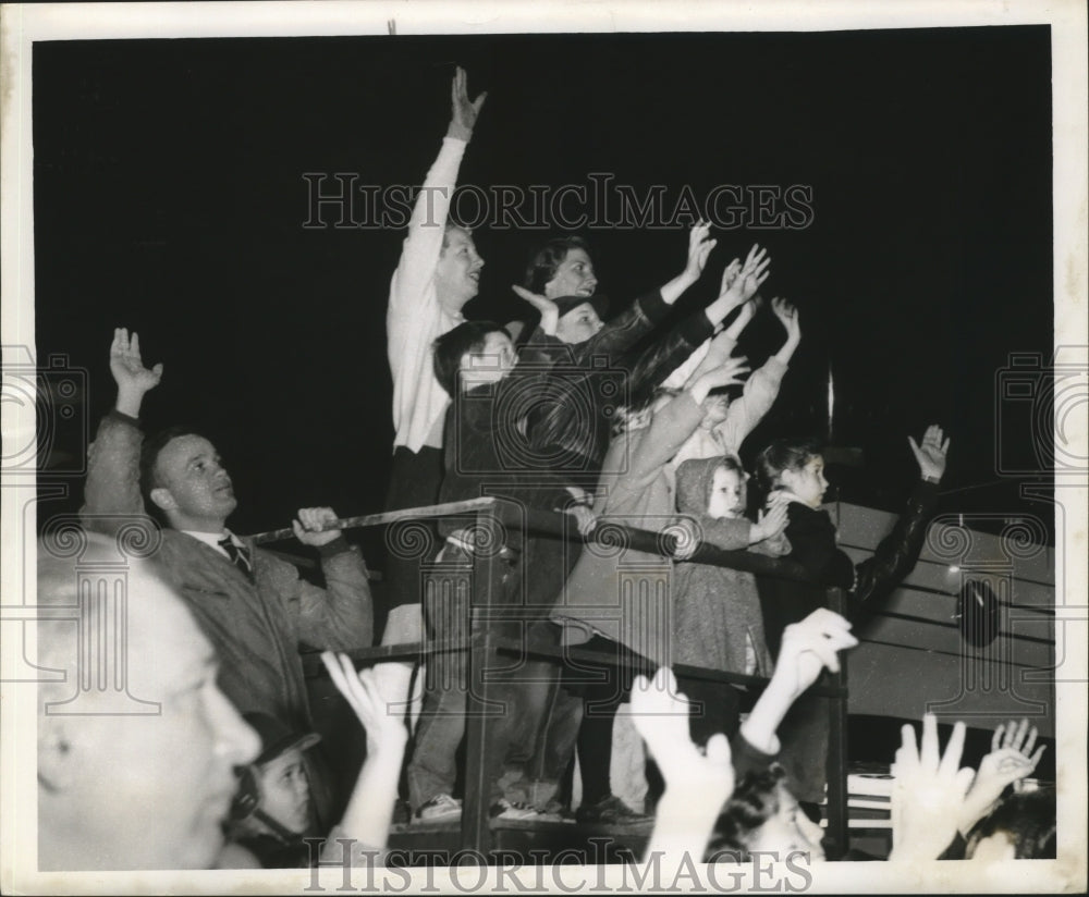 Carnival Parade Hands reach for throws from float in Momus parade. - Historic Images