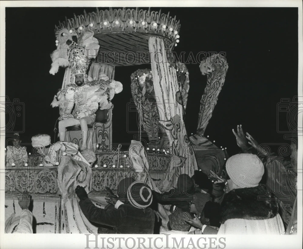 1978 Jupiter Member Sitting on Throne of Carnival Parade Float - Historic Images