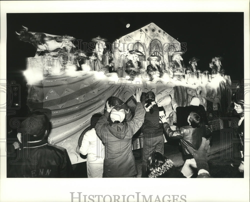 1980 Masked Hercules Members Drive by in Carnival Parade Float - Historic Images