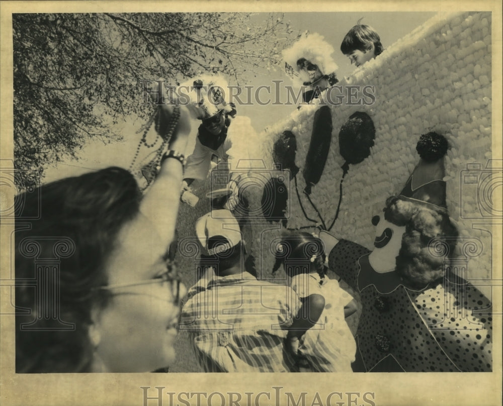 1992 Krewe of Lul Carnival Parade Float Greeted by Crowd  - Historic Images