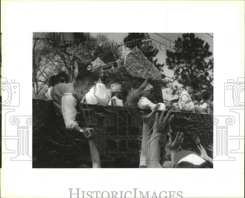 1993 Krewe of Lul Float Rider Hand out Beads During Carnival Parade - Historic Images