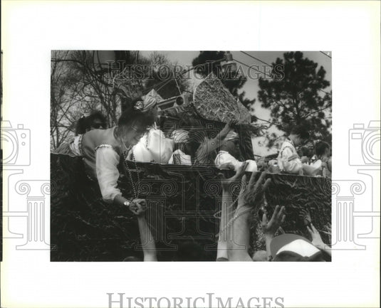 1993 Krewe of Lul Float Rider Hand out Beads During Carnival Parade - Historic Images