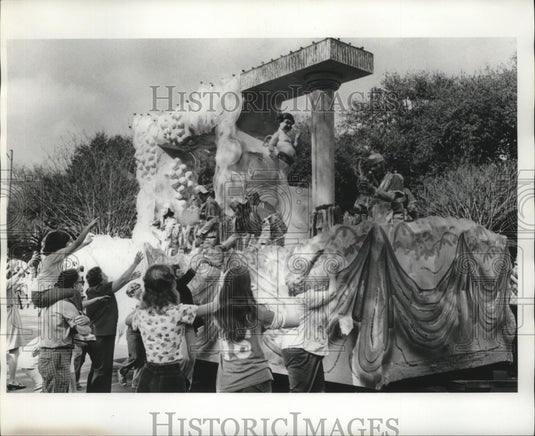1975 Float Passes Spectators from Krewe of Mokana Parade Mardi Gras - Historic Images