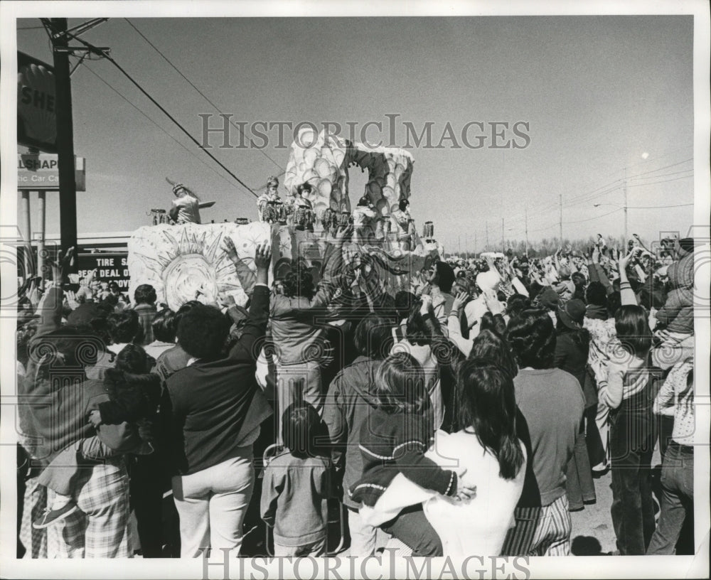 1974 Krewe of Isis Parade Float Watches by Crowd at Mardi Gras - Historic Images