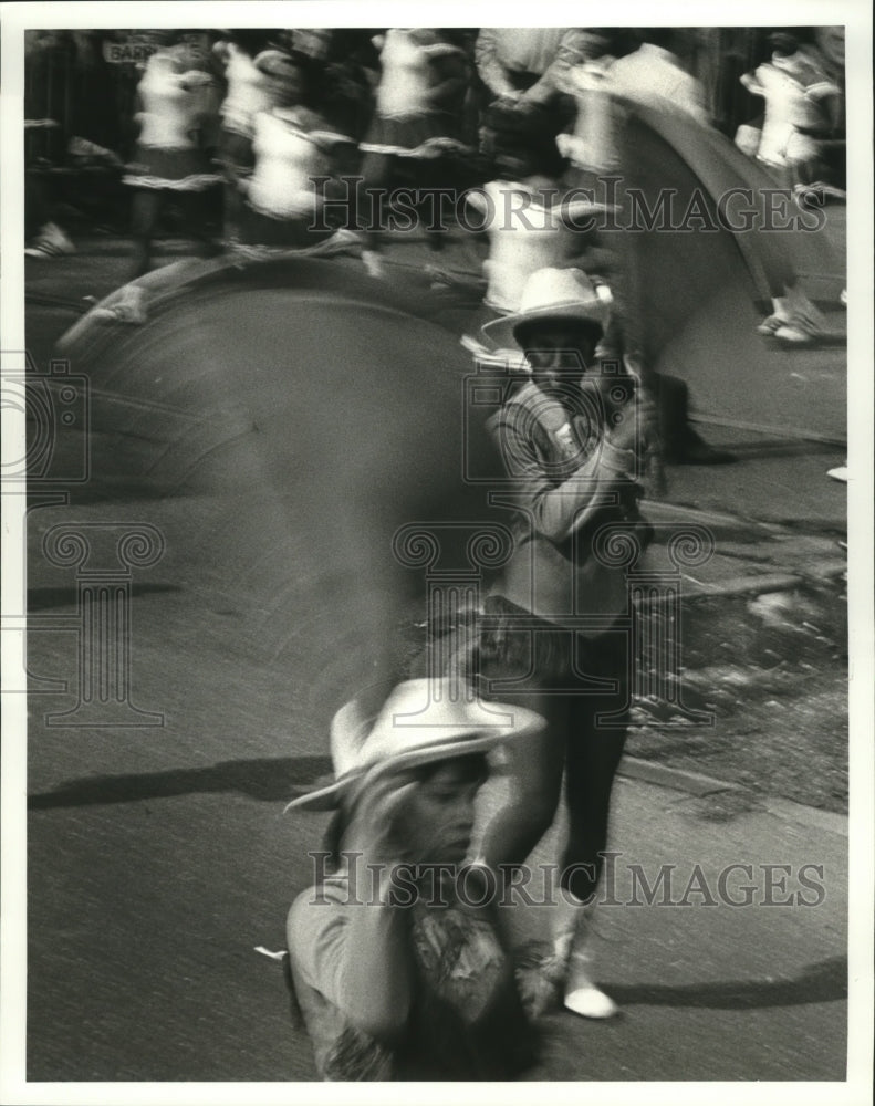 1986 Francis W. Gregory Jr. High Flag Girl in Iris Carnival Parade - Historic Images