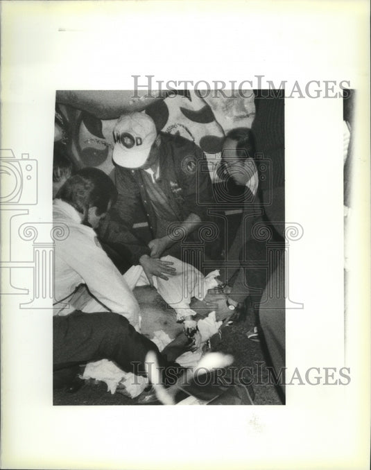 1990 Float Rider of Krewe of Hermes Parade Checked by Paramedics - Historic Images