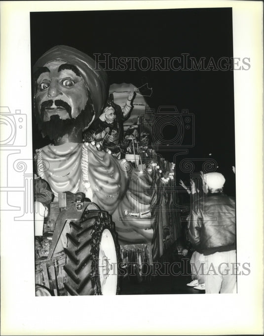 1990 Magic Lamp Float Rider in Krewe of Hercules Parade Mardi Gras - Historic Images