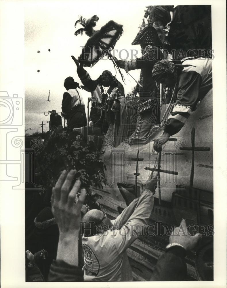 1980 Krewe of Grela Float Riders Hand Out Beads in Carnival Parade - Historic Images