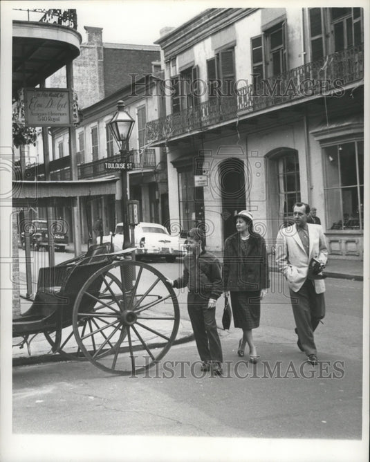 1961 Barrie, June & Ray Cox Walking in New Orleans Street - Historic Images