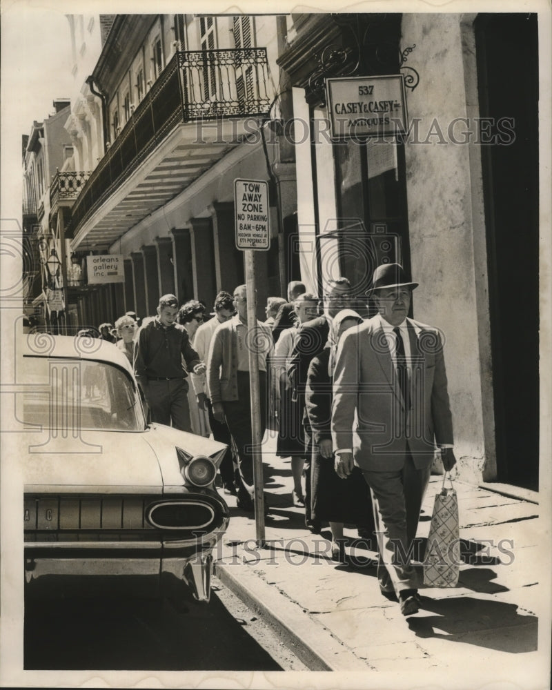 1962 Carnival Visitors Walking on New Orleans Sidewalk  - Historic Images