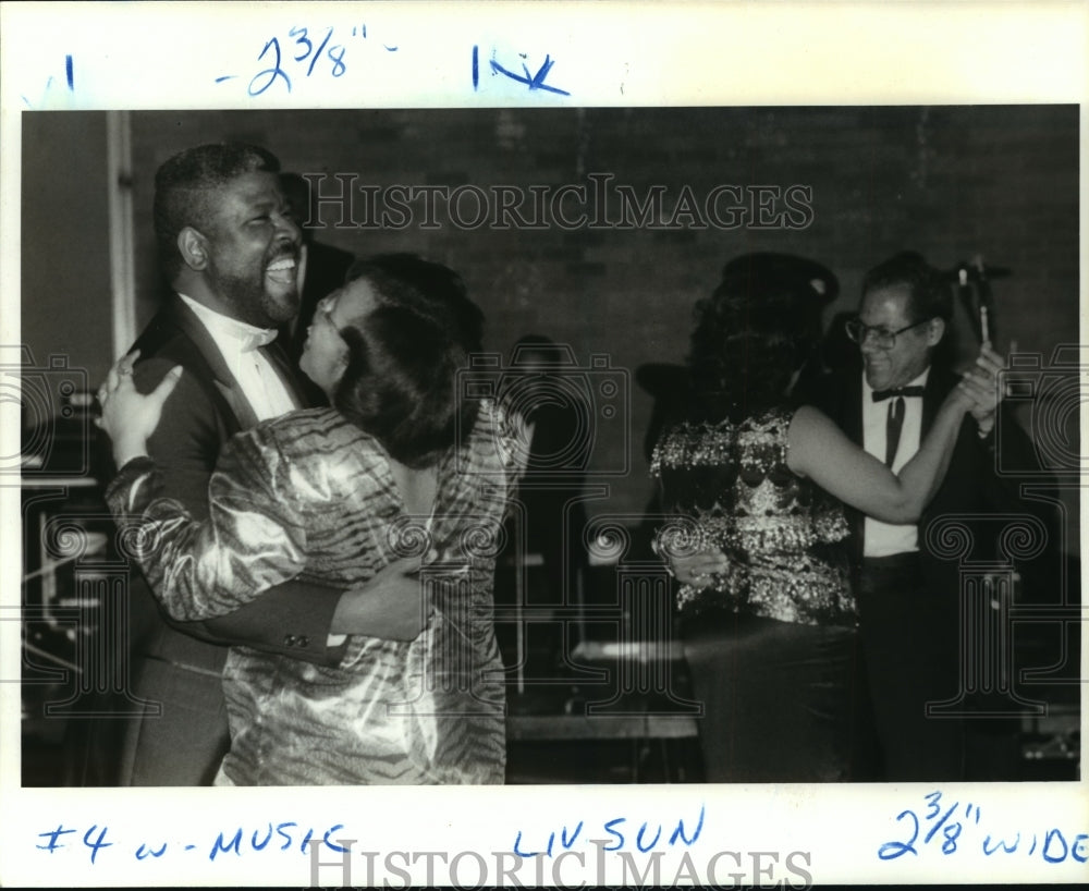 1988 Carnival Ball Revelers dance to strains of The Untouchables - Historic Images