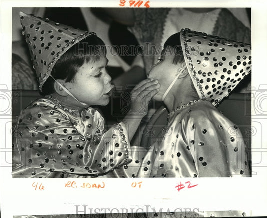 1987 Students of St. Joan of Arc School at Krewe Jeanne d' Arc ball - Historic Images