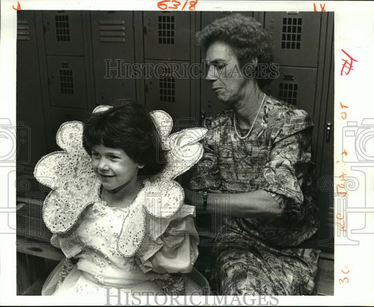 1987 Courtney Howard dressed for Krewe Jeanne d'Arc Mardi Gras ball - Historic Images