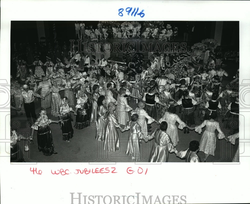 1987 Krewe of Jubilees Members Entertain with Krewe Drill at Ball - Historic Images