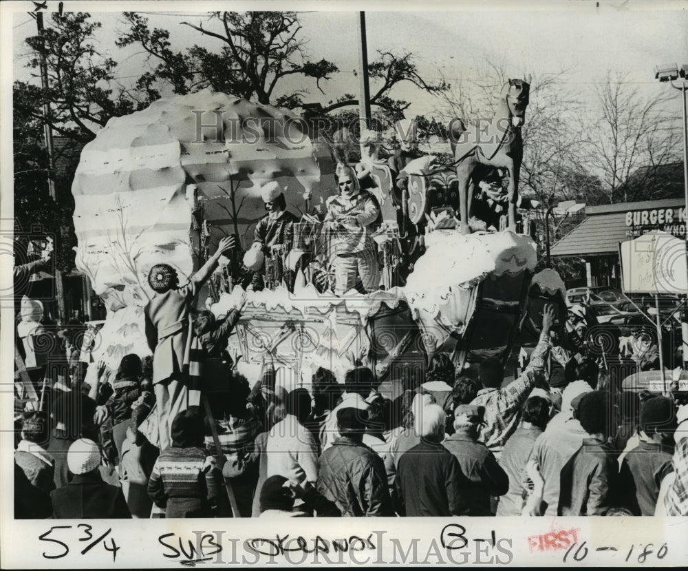 1978 Maskers Throw Beads in Krewe of Okeanos Parade at Carnival - Historic Images