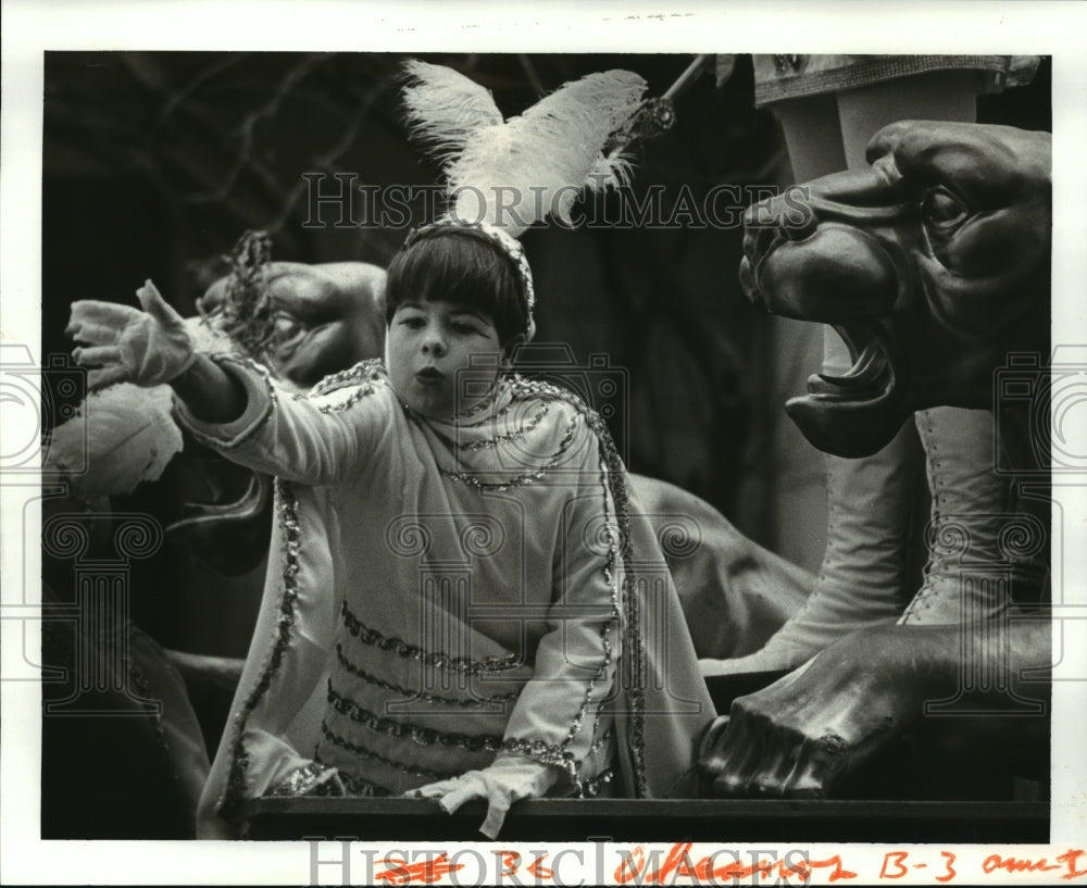 1987 Jeffrey Mackey as Page on King Okeanos Parade Float - Historic Images